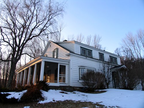 Winter:  Vermont farm house at sunset