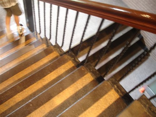 Stairs (At the bottom of the)